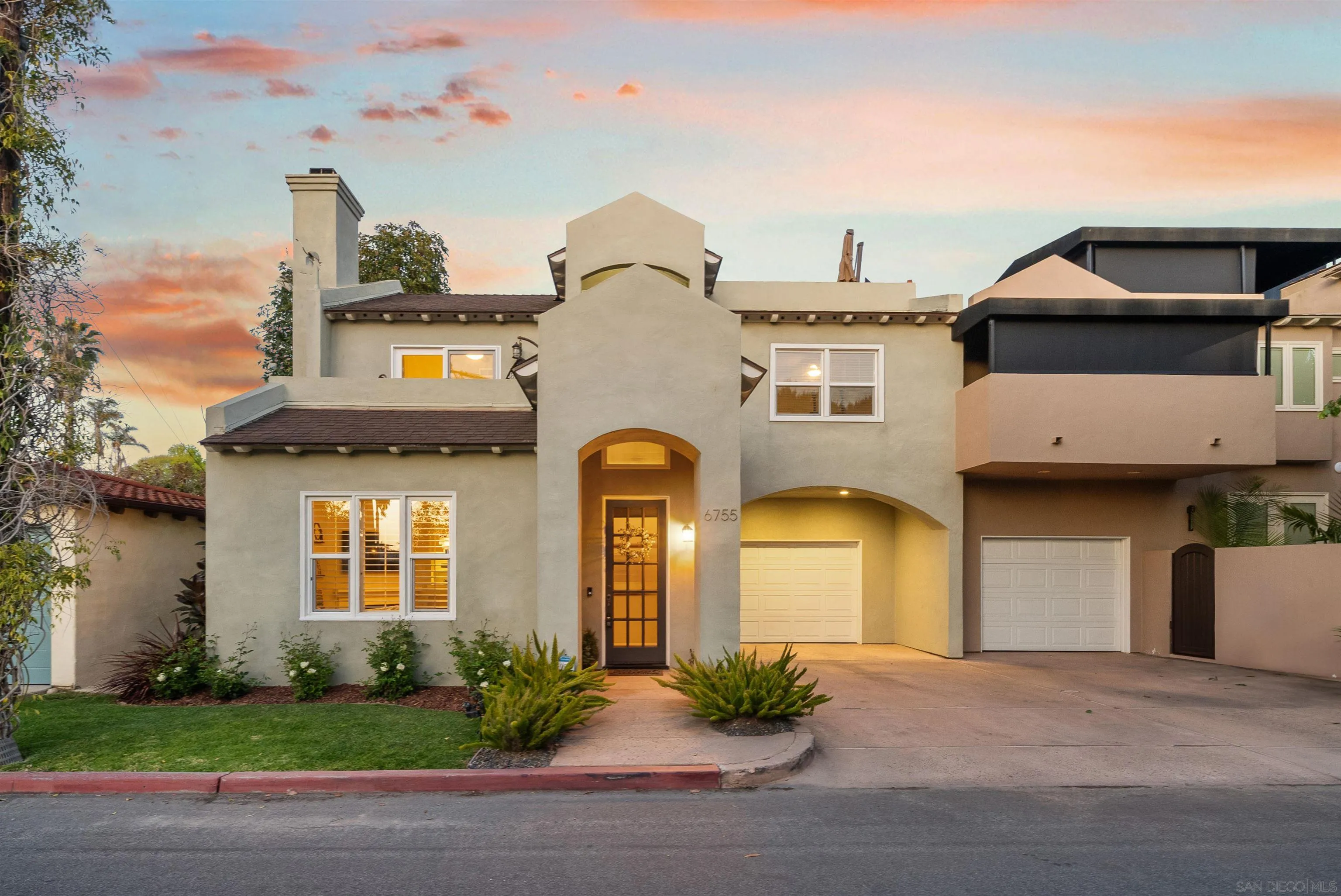 6755 Tyrian Street La Jolla, CA 92037 - Photo 49 of 60 a front view of a house with garden