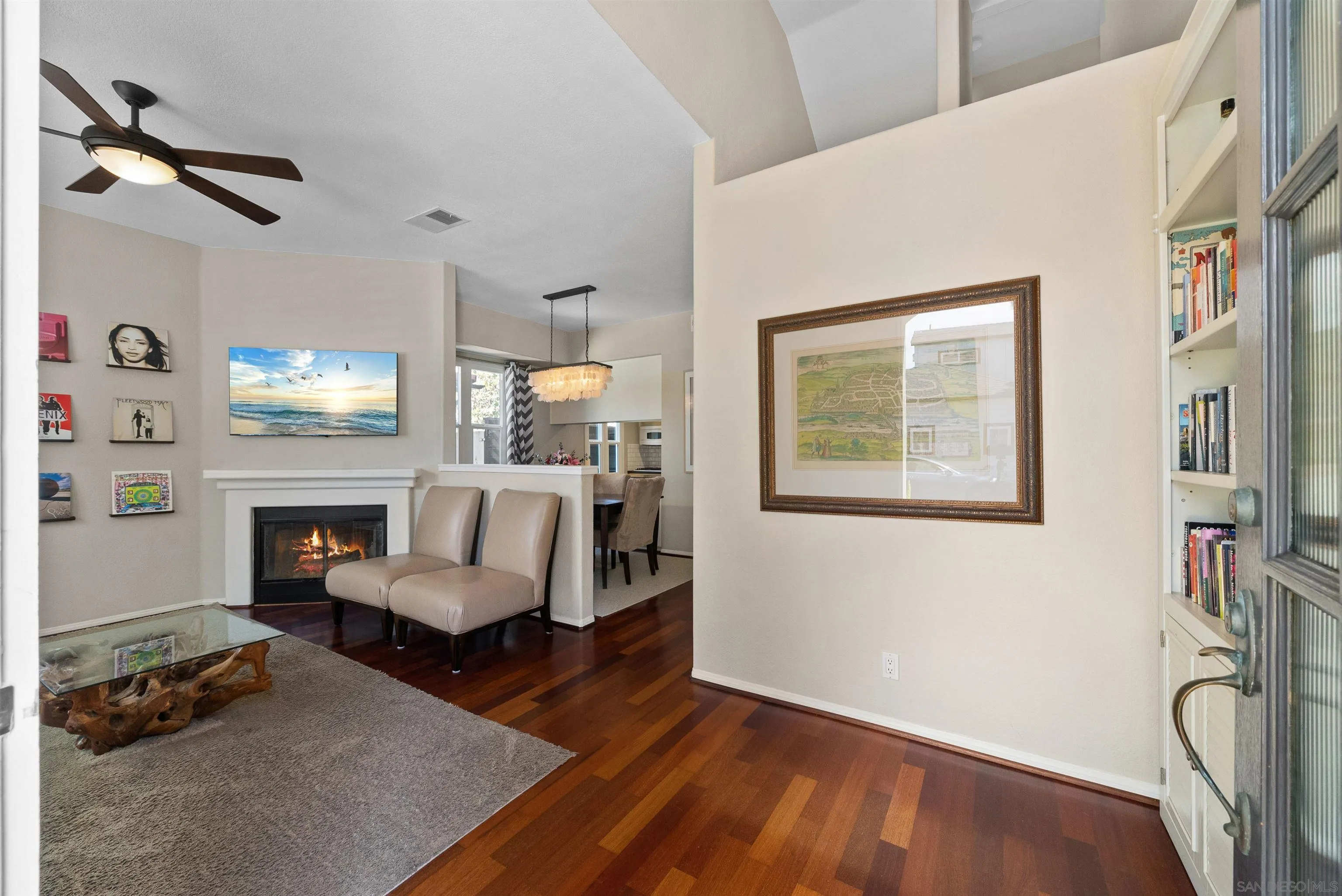 6755 Tyrian Street La Jolla, CA 92037 - Photo 9 of 60 a living room with furniture and a wooden floor