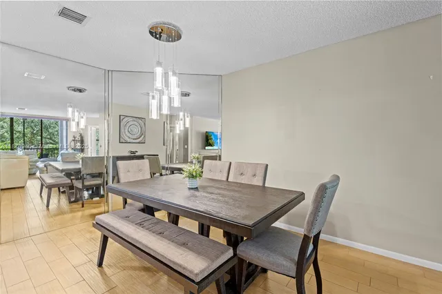 a view of a dining room with furniture