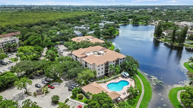 an aerial view of a house with outdoor space