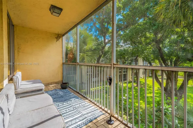 a balcony view with a lake view