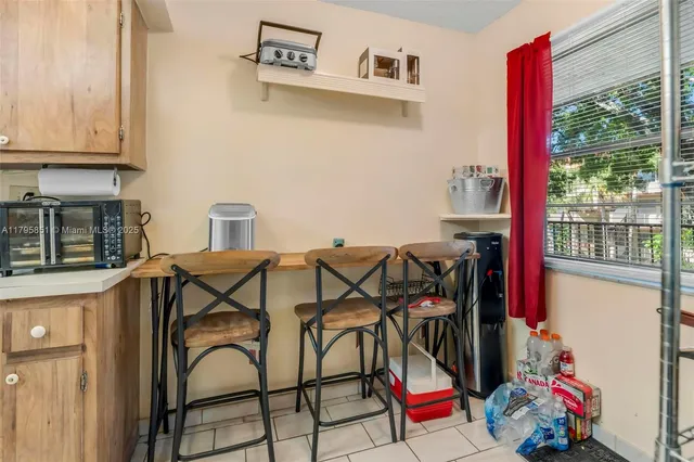 a view of dinning table and chairs in the kitchen