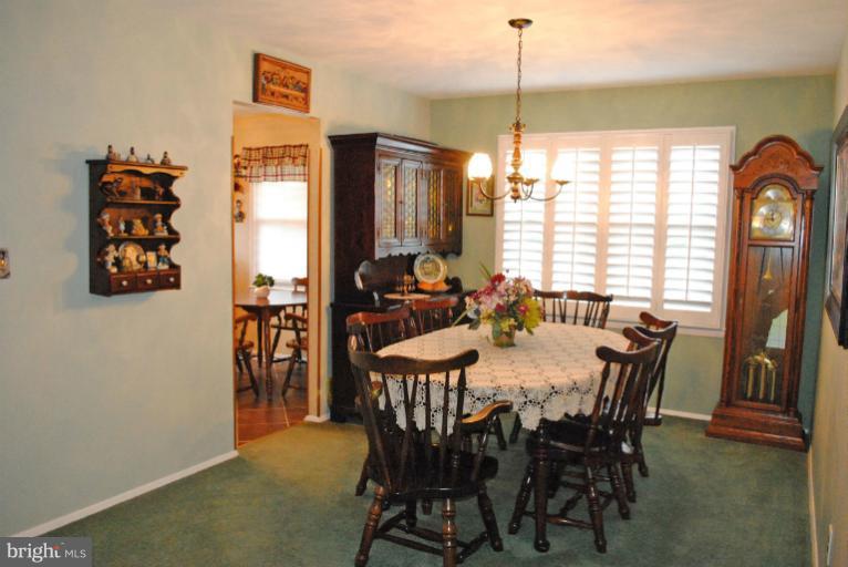 8901 Parlo Road Baltimore, MD 21236 - Photo 3 of 27 a view of a dining room with furniture window and outside view