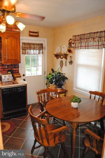 8901 Parlo Road Baltimore, MD 21236 - Photo 8 of 27 a dining room with furniture and window