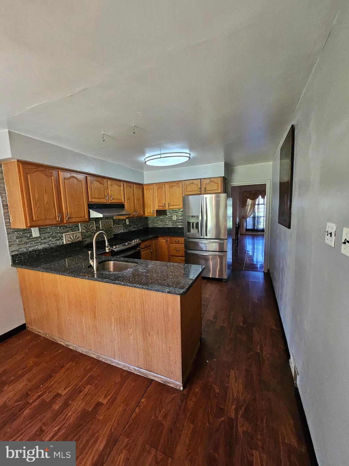 148 Church Road Elkins Park, PA 19027 - Photo 13 of 33 a living room with furniture and a large window