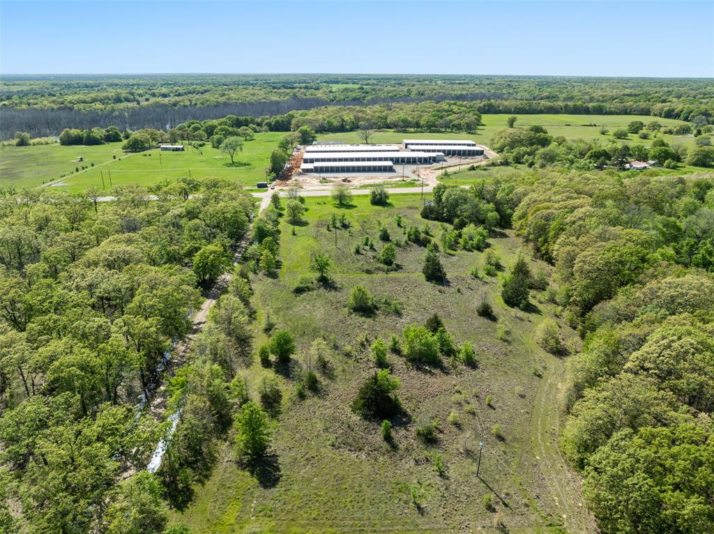 320 Fm 897 Telephone, TX 75488 - Photo 2 of 11 a view of a city with lush green forest