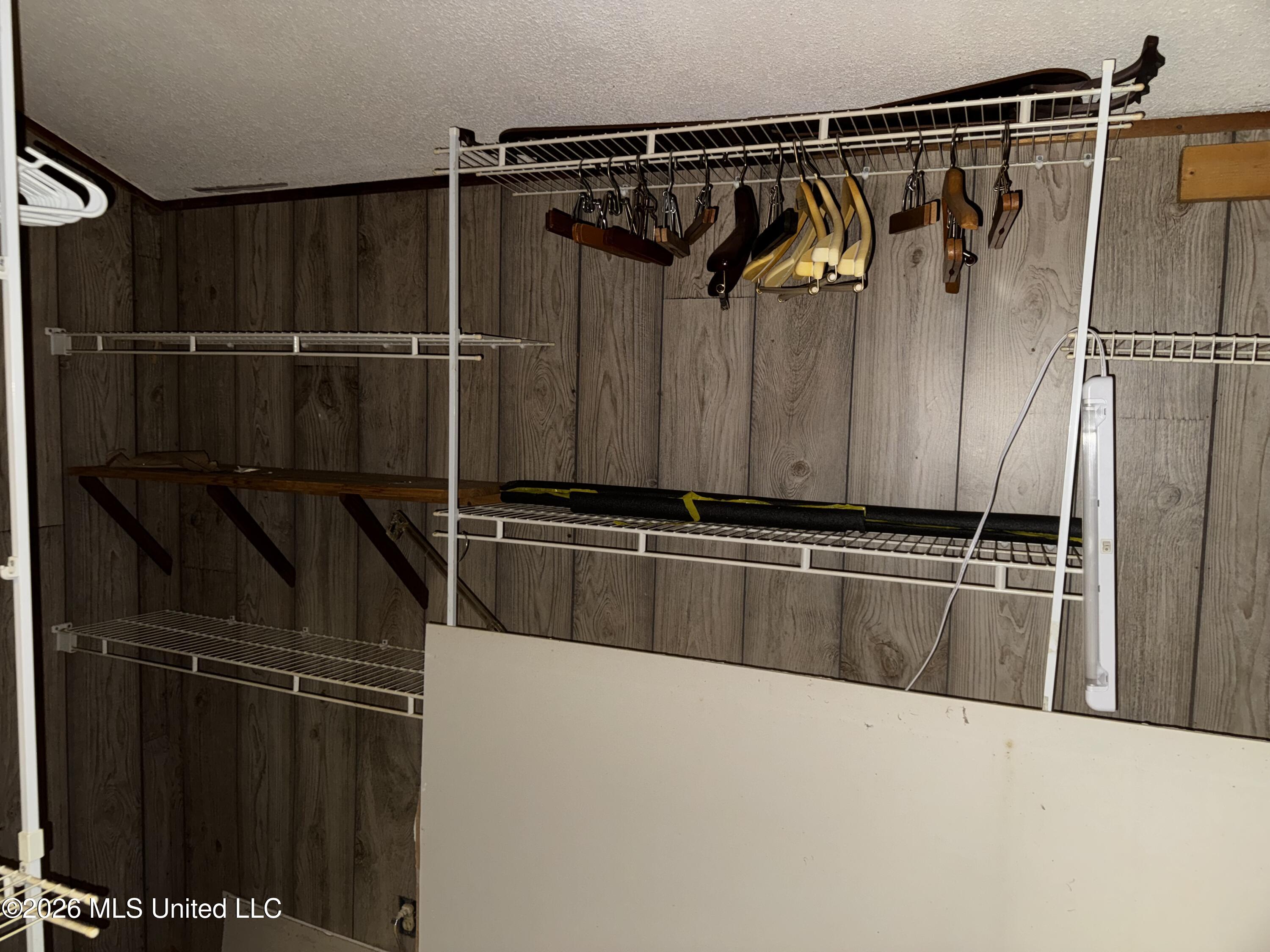 2830 Woodland Lake Road Hernando, MS 38632 - Photo 21 of 37 Large walk-in closet w/ outside access