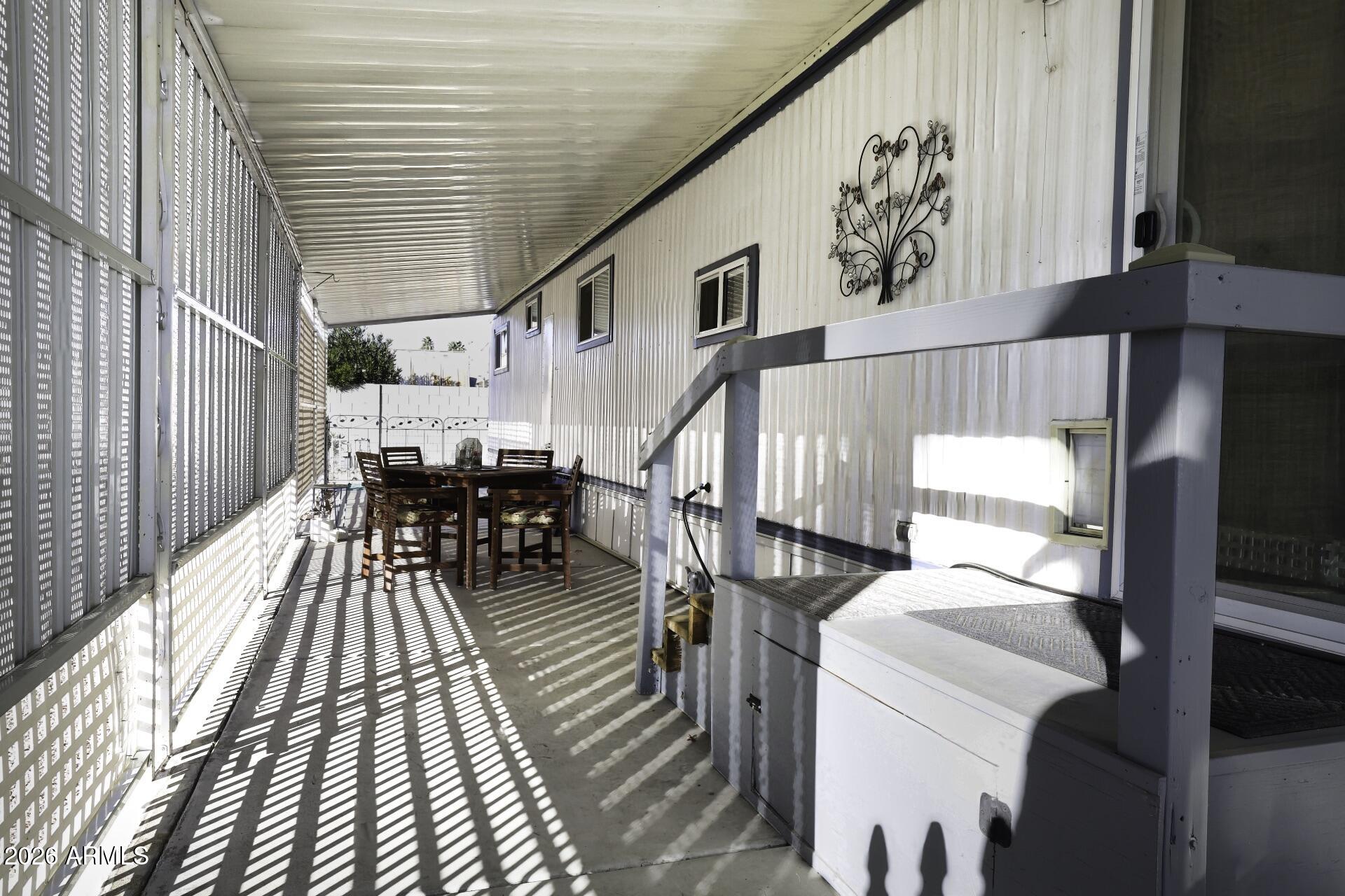 8600 East Broadway Road, Unit 13 Mesa, AZ 85208 - Photo 14 of 16 a view of a livingroom with furniture and staircase