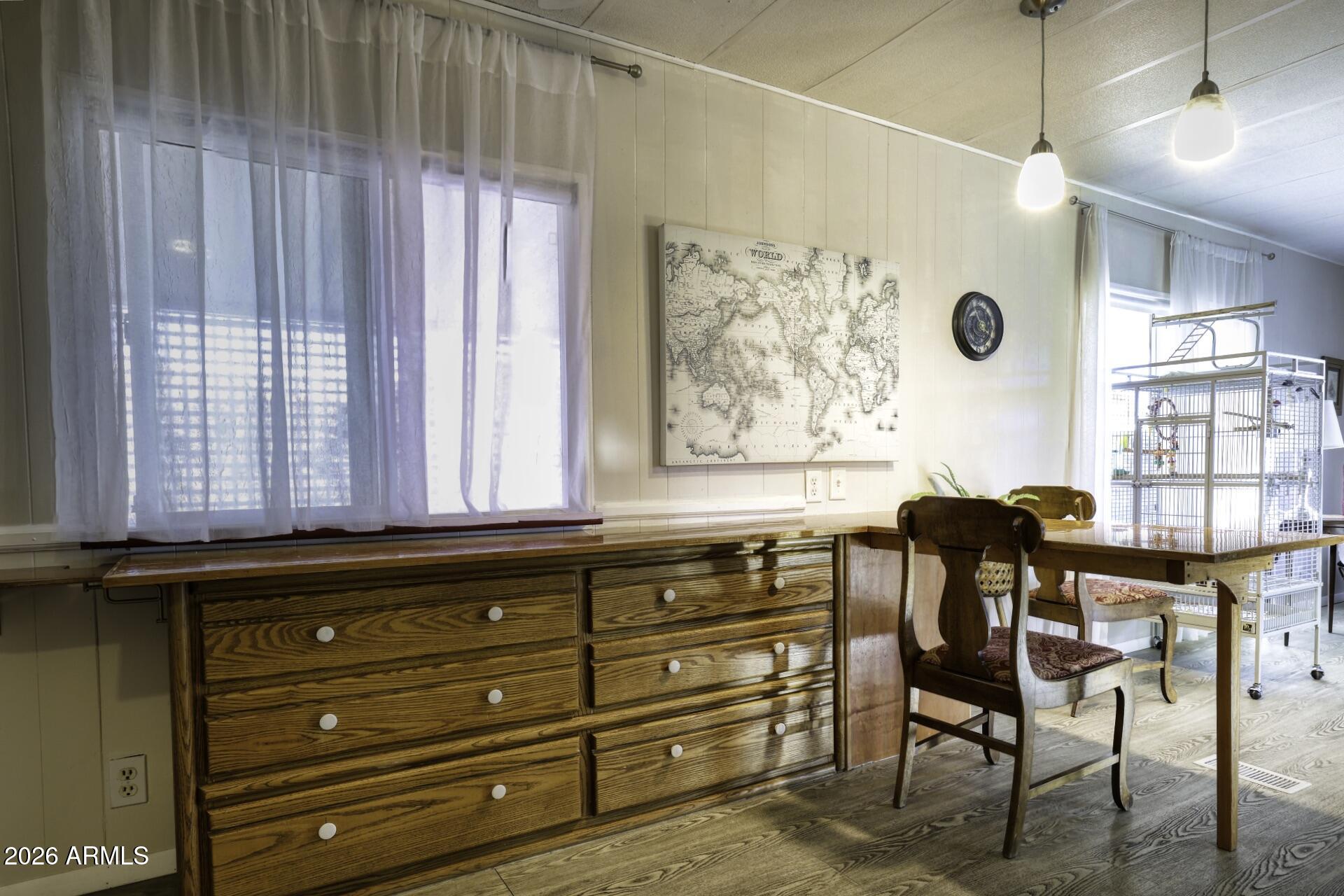 8600 East Broadway Road, Unit 13 Mesa, AZ 85208 - Photo 6 of 16 a view of a livingroom with furniture and windows