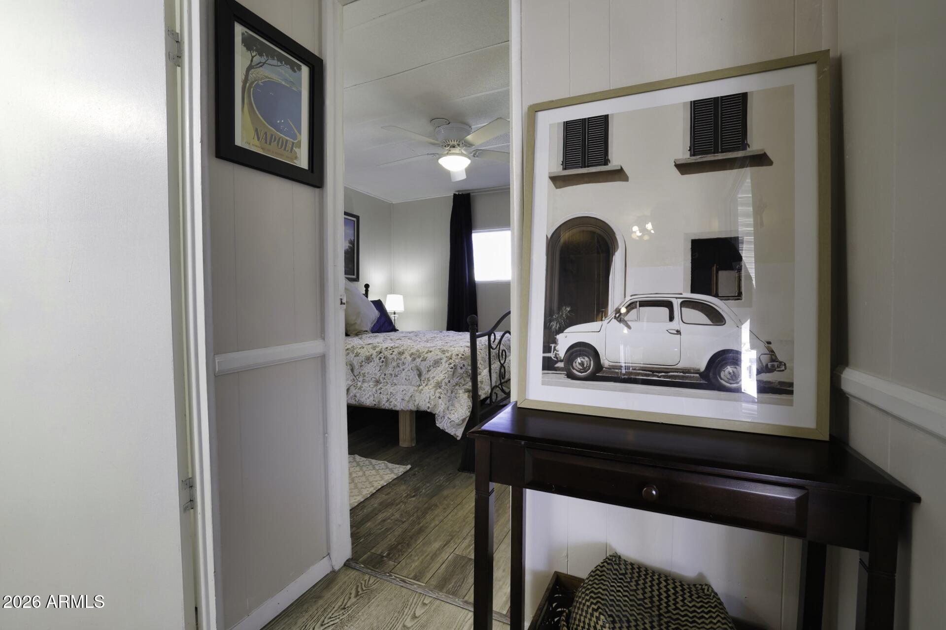 8600 East Broadway Road, Unit 13 Mesa, AZ 85208 - Photo 7 of 16 a view of living room with furniture and a mirror
