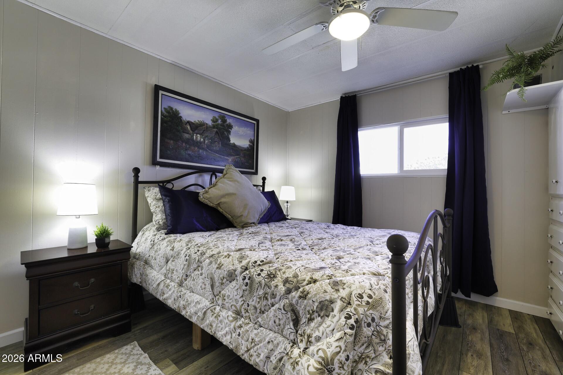 8600 East Broadway Road, Unit 13 Mesa, AZ 85208 - Photo 8 of 16 a bedroom with bed and window