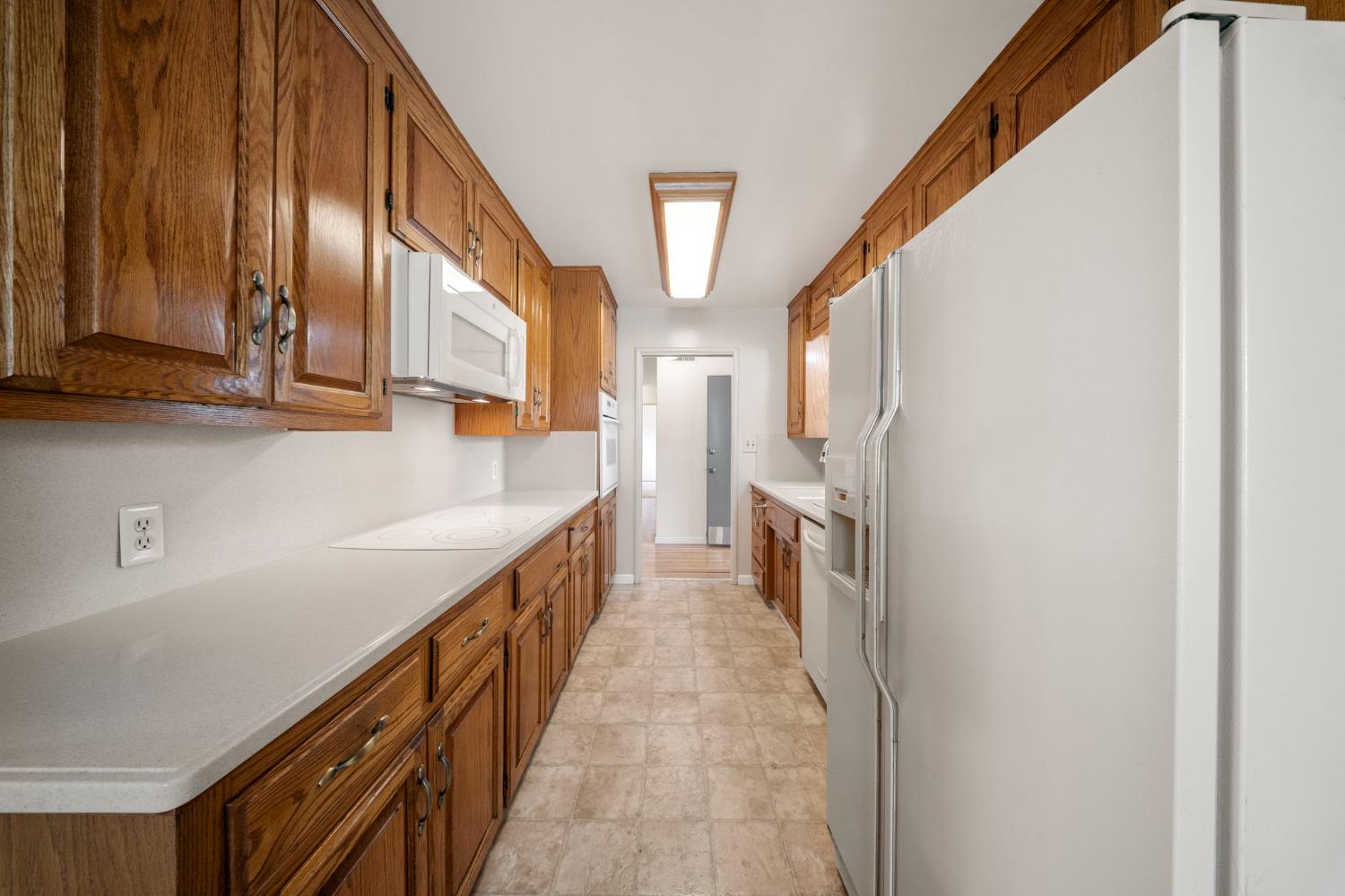 1500 Crestview Drive Modesto, CA 95355 - Photo 13 of 32 a view of a kitchen with car parked
