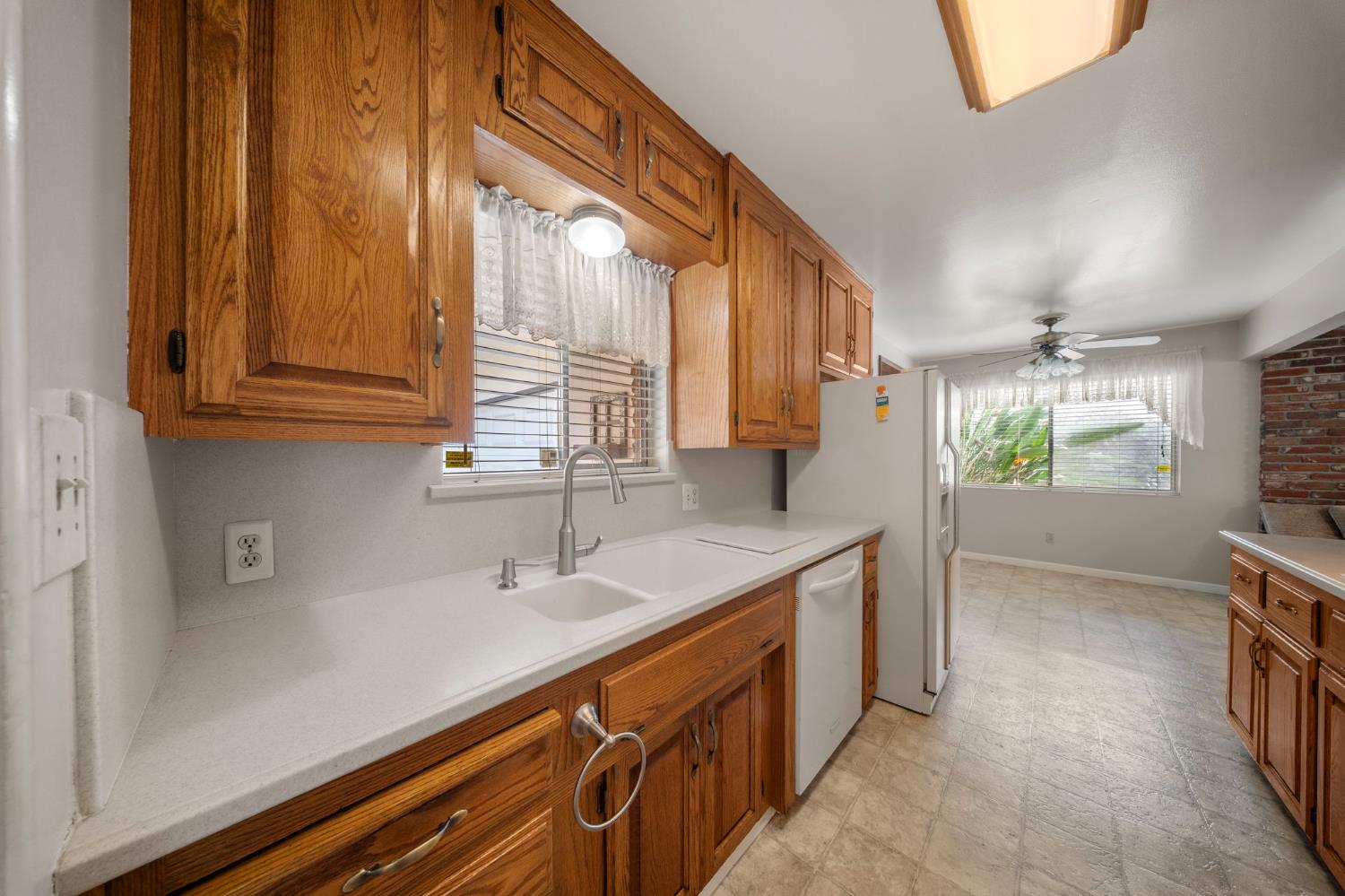 1500 Crestview Drive Modesto, CA 95355 - Photo 14 of 32 a bathroom with a sink and a mirror