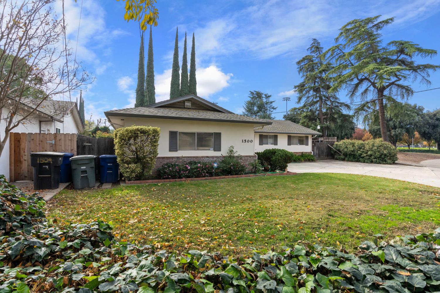 1500 Crestview Drive Modesto, CA 95355 - Photo 2 of 32 a view of a house with garden