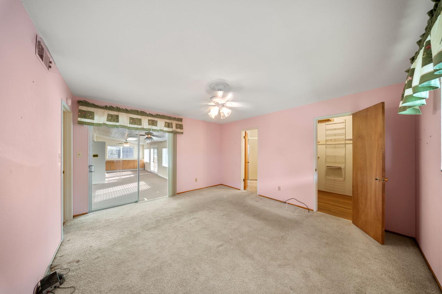 1500 Crestview Drive Modesto, CA 95355 - Photo 22 of 32 a view of an empty room with a window