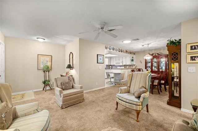 a view of a dining room and chandelier