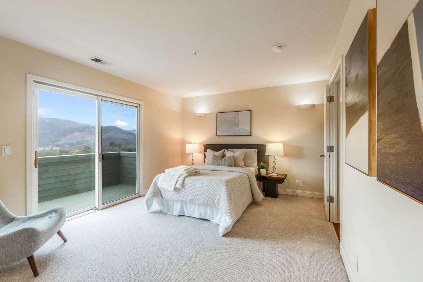 22340 Regnart Road Cupertino, CA 95014 - Photo 18 of 74 a bed room with a bed and a night stand