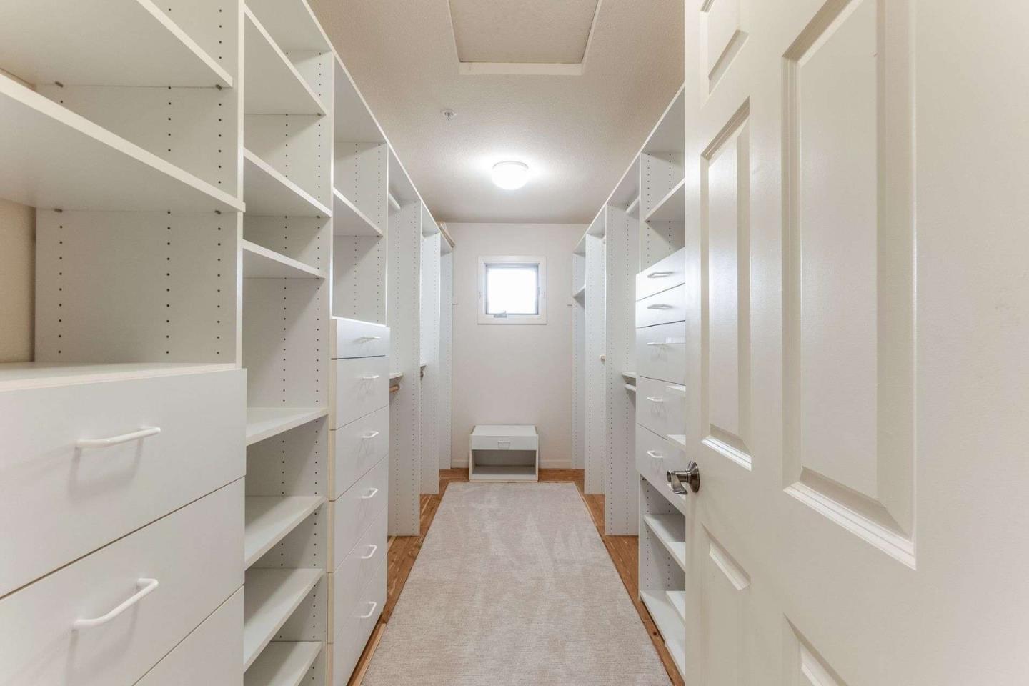 22340 Regnart Road Cupertino, CA 95014 - Photo 24 of 74 a bathroom with a bathtub and a shower