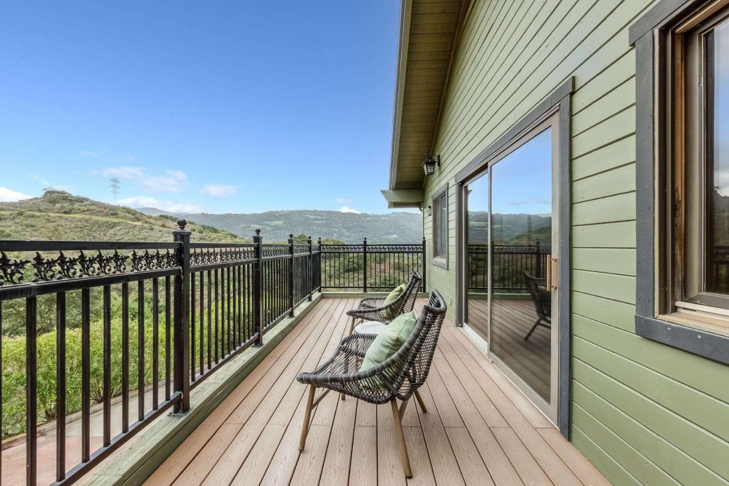 22340 Regnart Road Cupertino, CA 95014 - Photo 27 of 74 a view of a balcony with chairs and wooden floor
