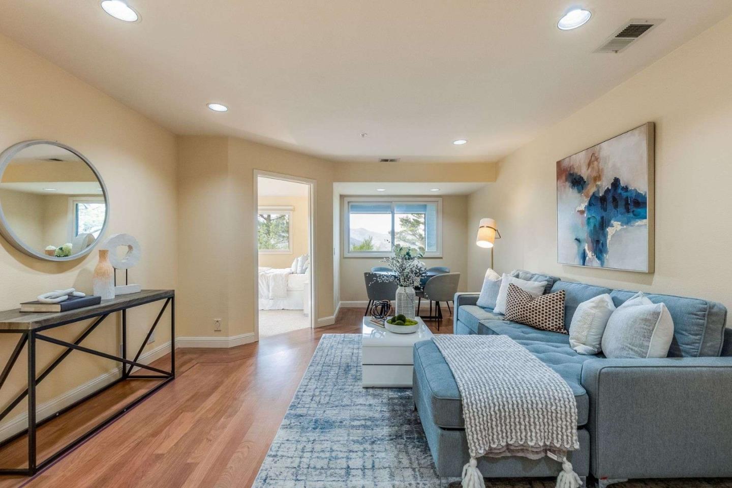 22340 Regnart Road Cupertino, CA 95014 - Photo 28 of 74 a living room with furniture
