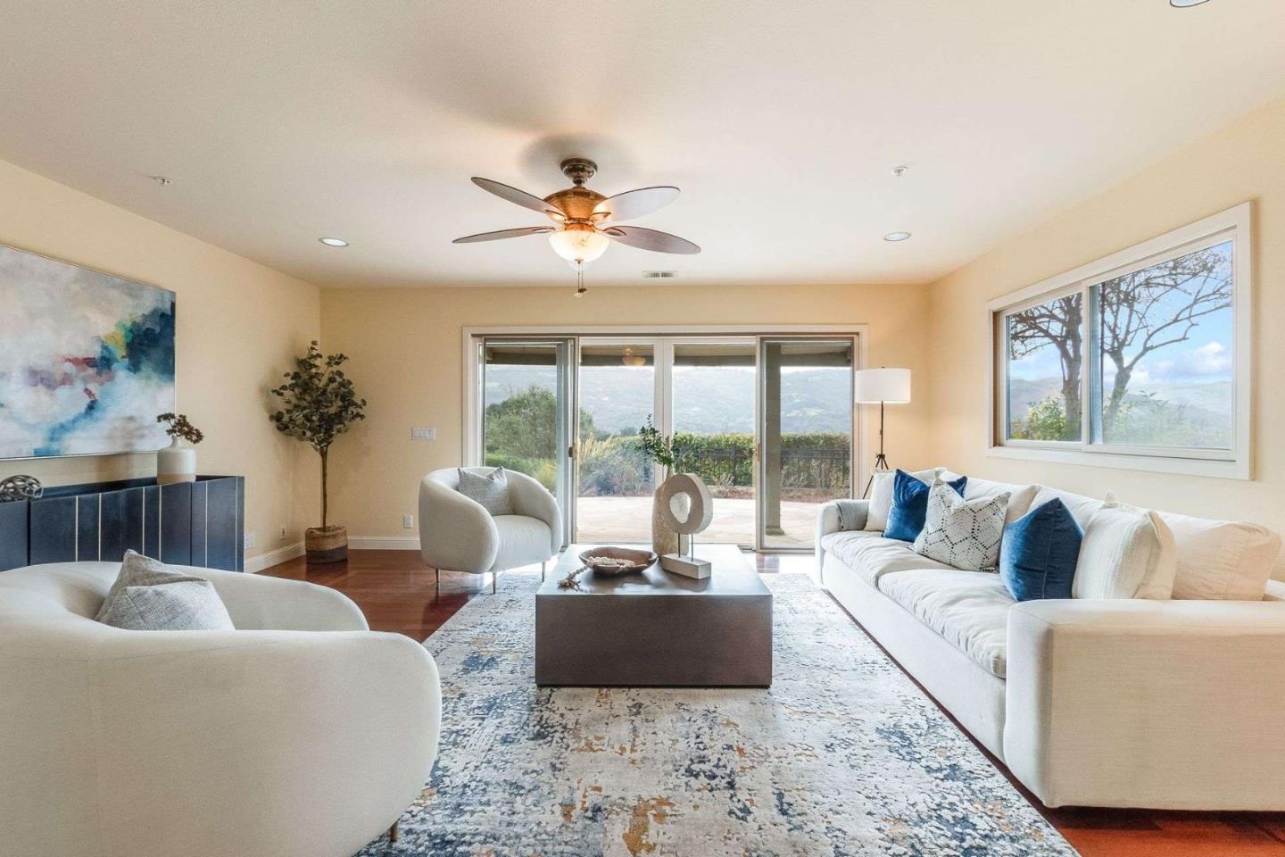 22340 Regnart Road Cupertino, CA 95014 - Photo 36 of 74 a living room with furniture and a large window