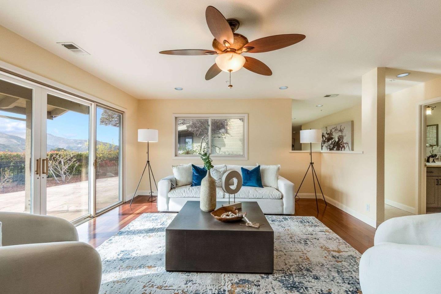 22340 Regnart Road Cupertino, CA 95014 - Photo 38 of 74 a living room with furniture and a large window