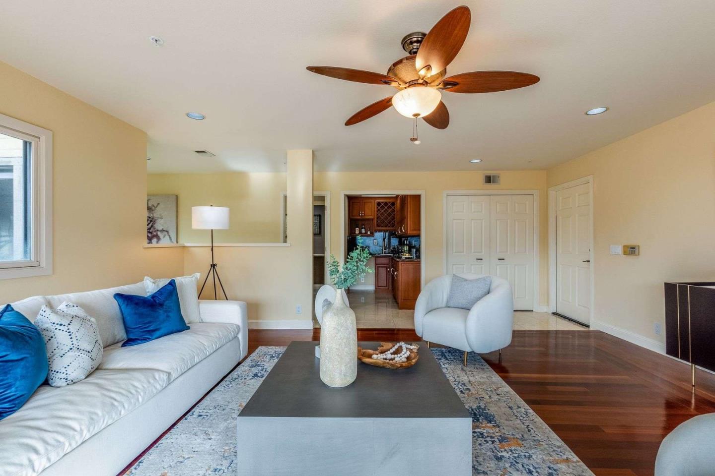 22340 Regnart Road Cupertino, CA 95014 - Photo 39 of 74 a living room with furniture and a wooden floor