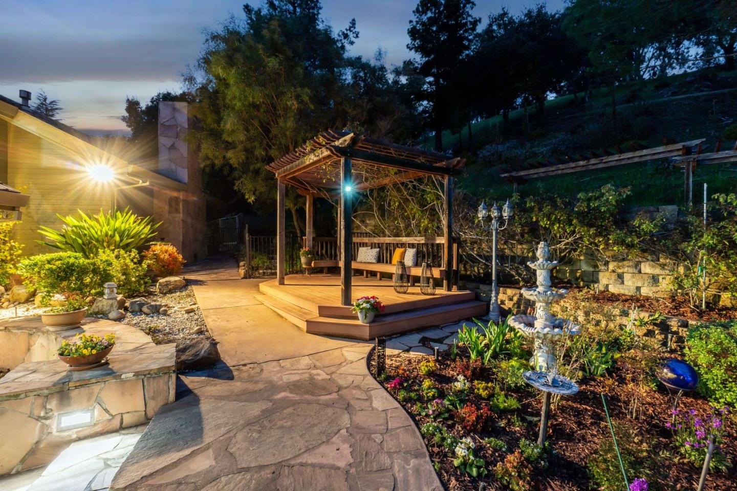 22340 Regnart Road Cupertino, CA 95014 - Photo 54 of 74 a view of a chairs and tables in the patio