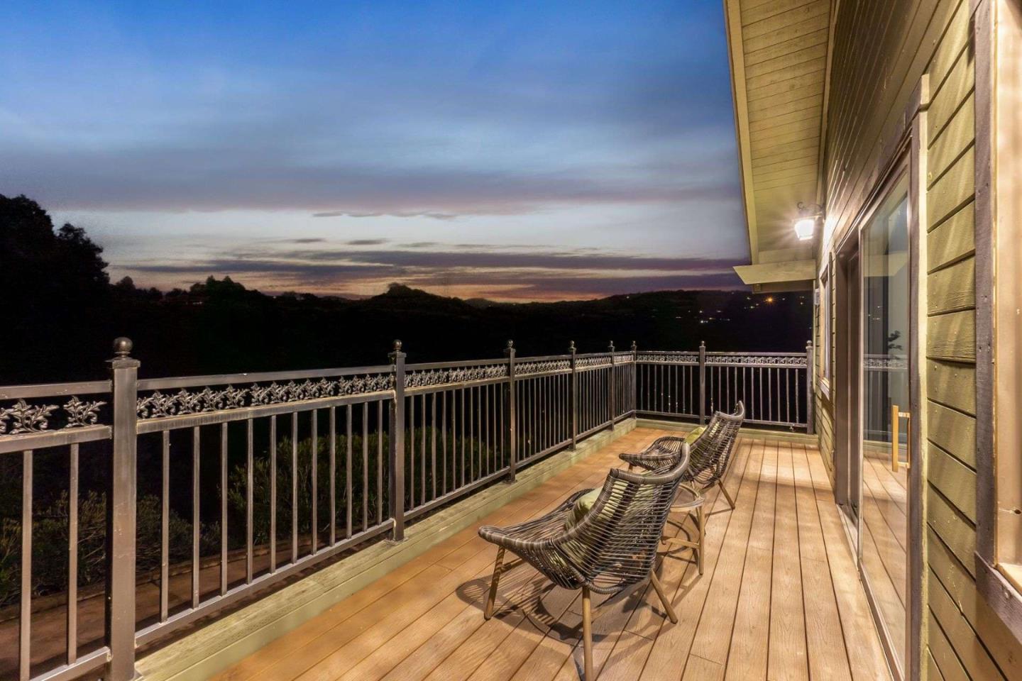 22340 Regnart Road Cupertino, CA 95014 - Photo 57 of 74 a view of balcony with wooden floor and a floor to ceiling window