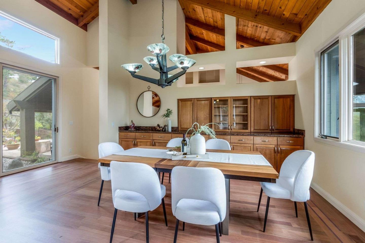 22340 Regnart Road Cupertino, CA 95014 - Photo 10 of 74 a view of a dining room with furniture window and wooden floor