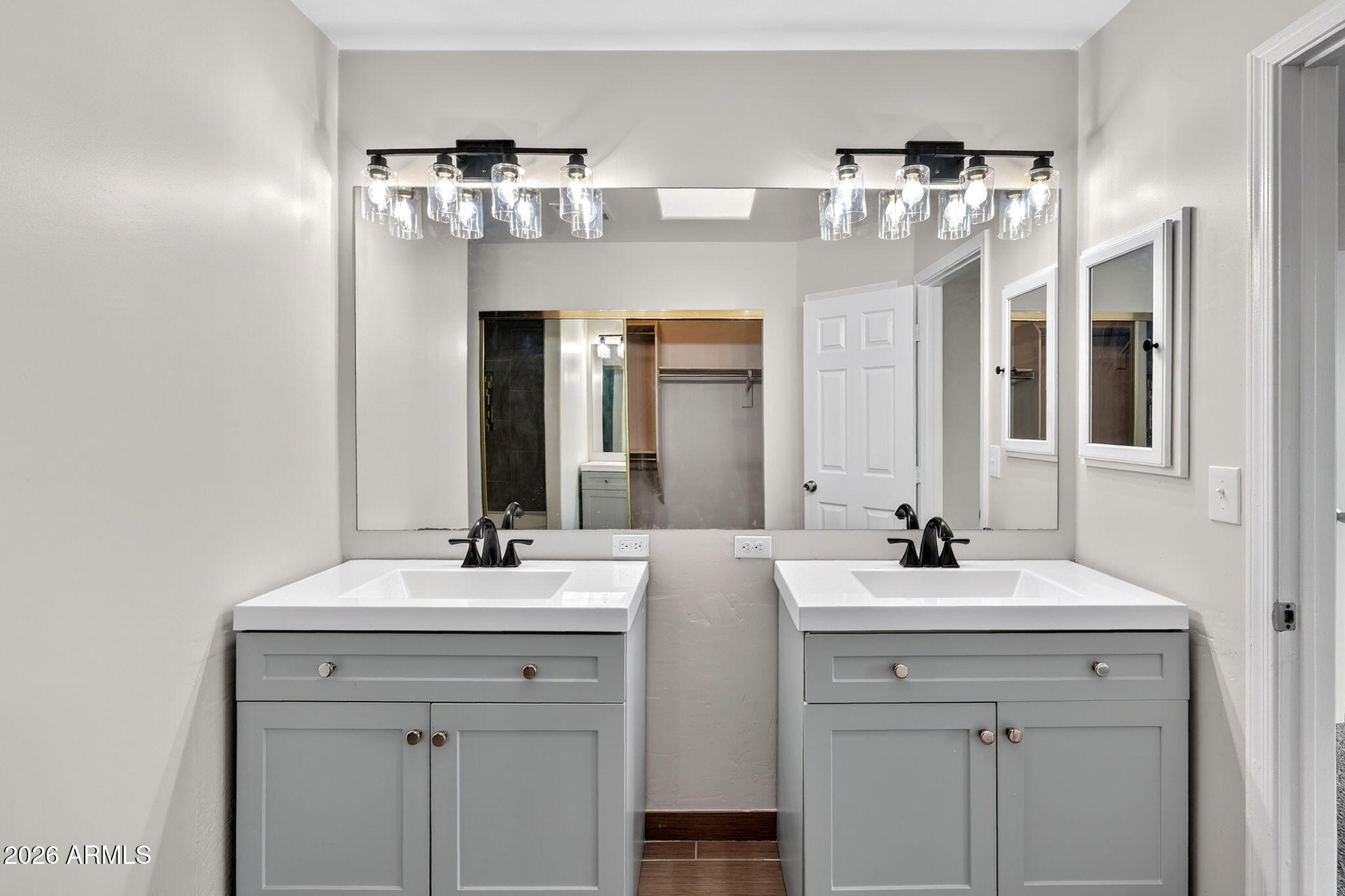 1417 East Mineral Road Gilbert, AZ 85234 - Photo 36 of 59 a bathroom with a double vanity sink mirror and