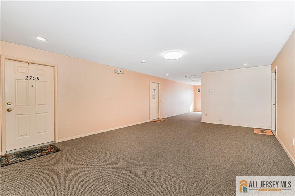 2710 Ridgefield Court Helmetta, NJ 08828 - Photo 28 of 32 a view of an empty room