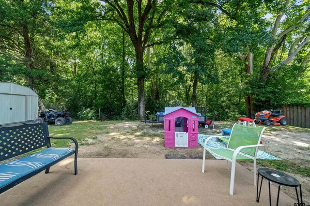 a view of a house with furniture
