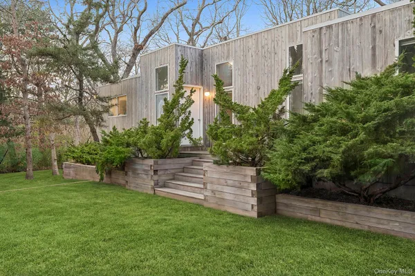 a view of a back yard of the house