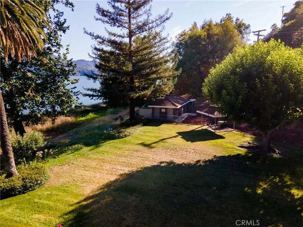 a view of swimming pool with a yard
