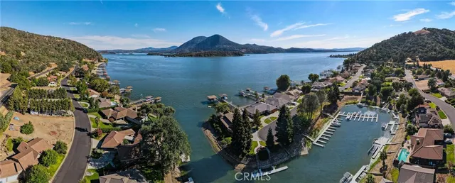 an aerial view of a house with outdoor space