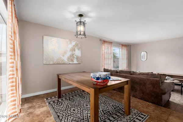 a kitchen that has a lot of cabinets in it and appliances
