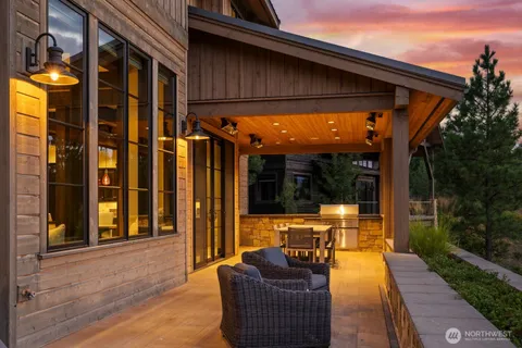 a view of swimming pool with patio