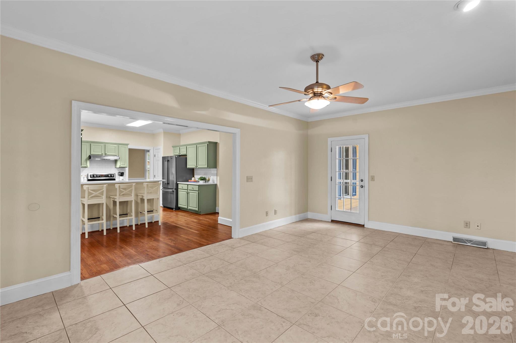 131 Morrison Hill Road Davidson, NC 28036 - Photo 12 of 47 a view of livingroom with hardwood floor and a ceiling fan