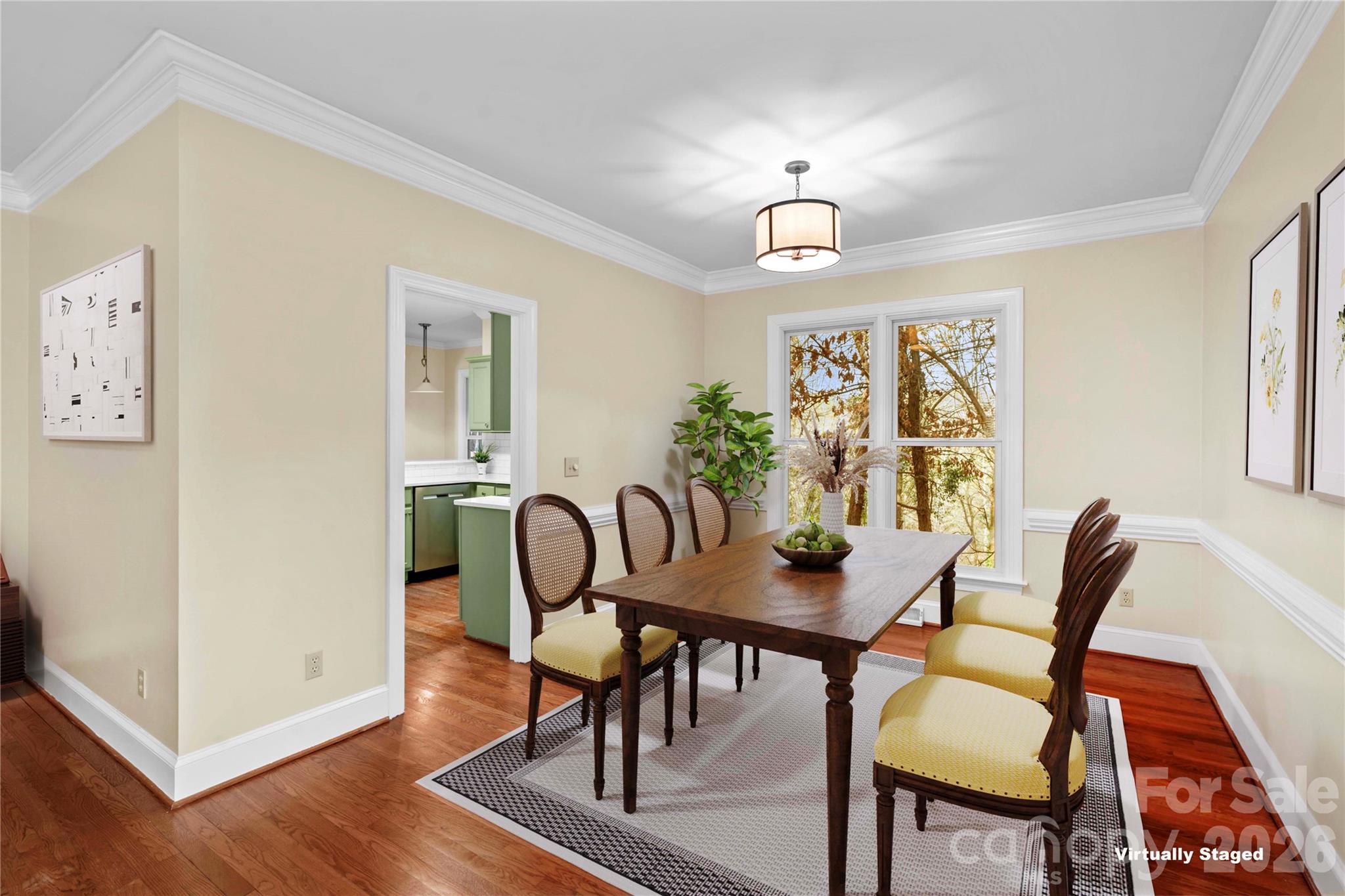 131 Morrison Hill Road Davidson, NC 28036 - Photo 17 of 47 a view of a dining room with furniture and wooden floor