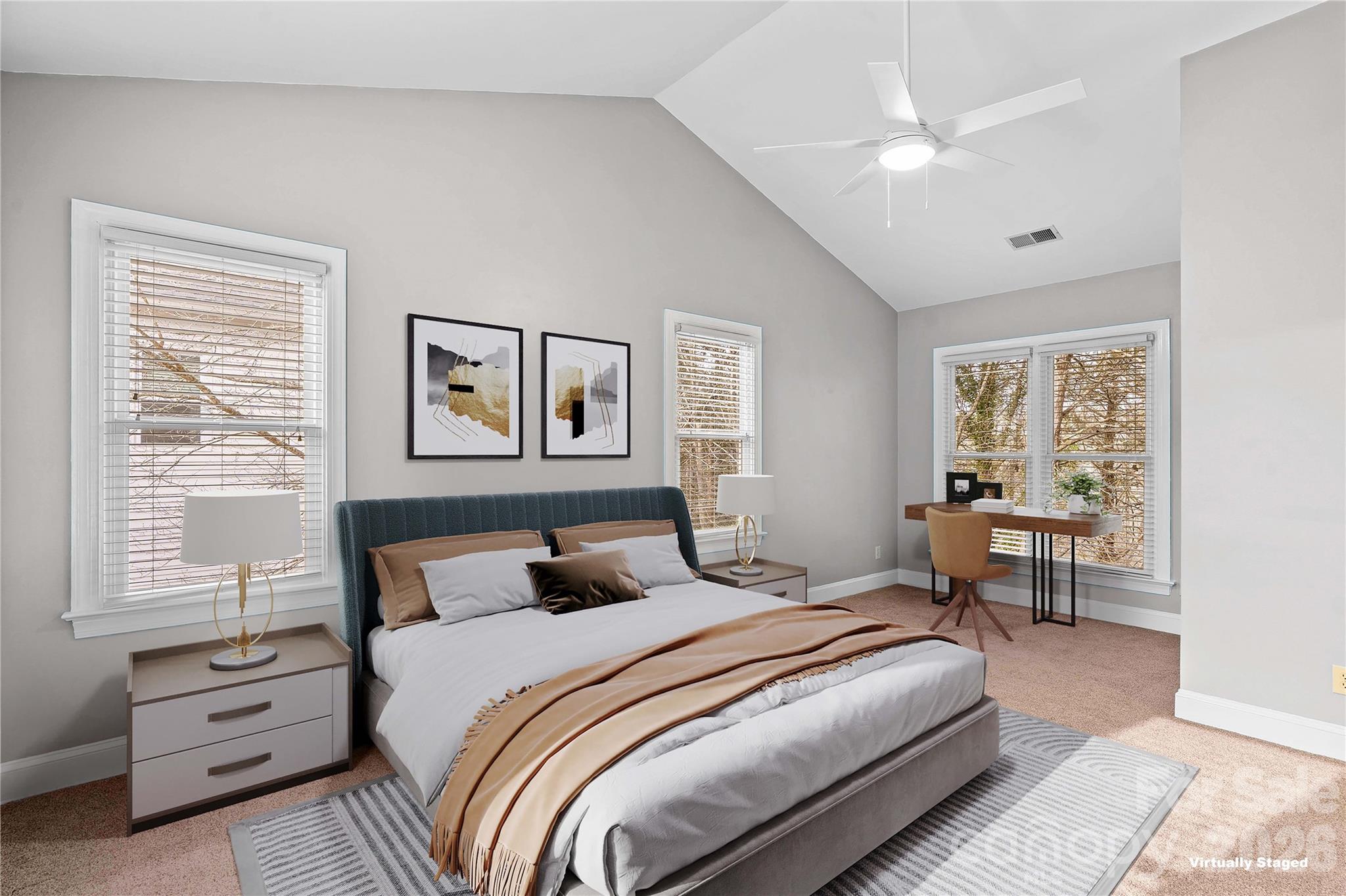 131 Morrison Hill Road Davidson, NC 28036 - Photo 26 of 47 a bedroom with a large bed and a table
