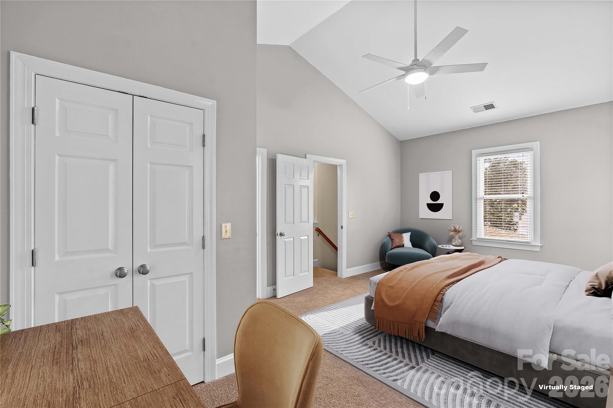 131 Morrison Hill Road Davidson, NC 28036 - Photo 27 of 47 a bedroom with a bed and a chandelier