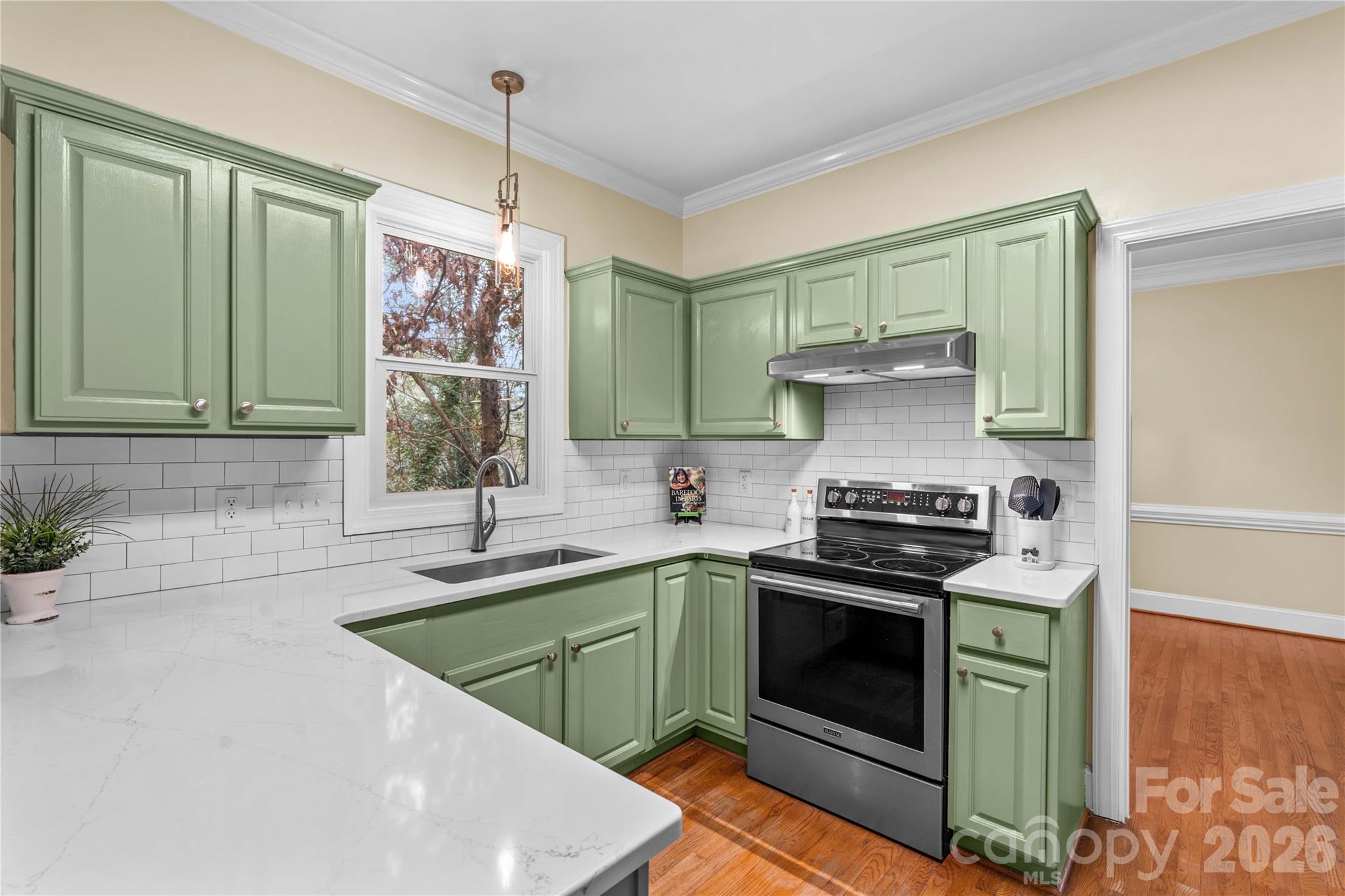 131 Morrison Hill Road Davidson, NC 28036 - Photo 6 of 47 a kitchen with stainless steel appliances granite countertop a sink a stove and cabinets