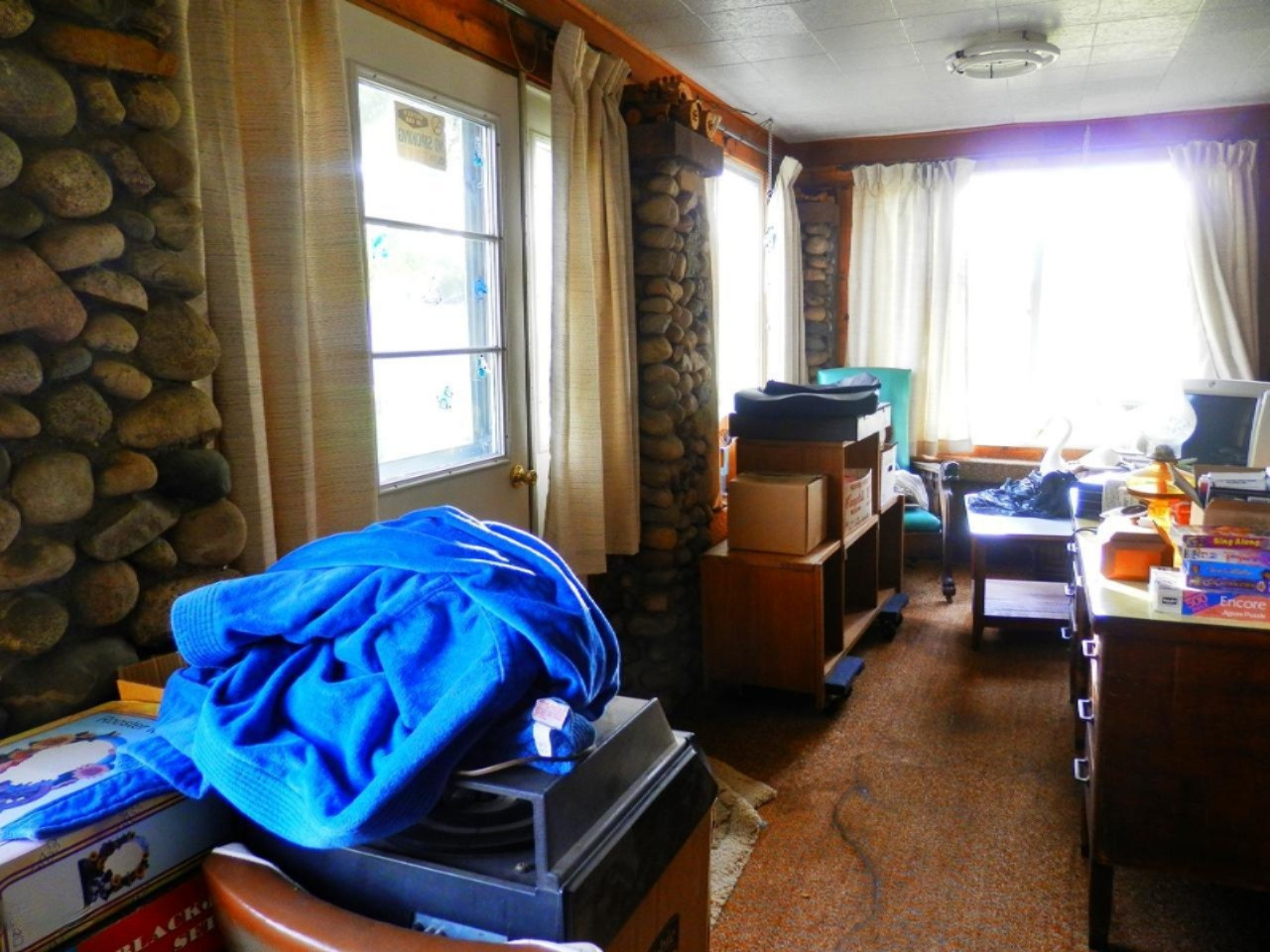 20198 Faylor Road Copemish, MI 49625 - Photo 20 of 37 Stone pillars on enclosed front porch