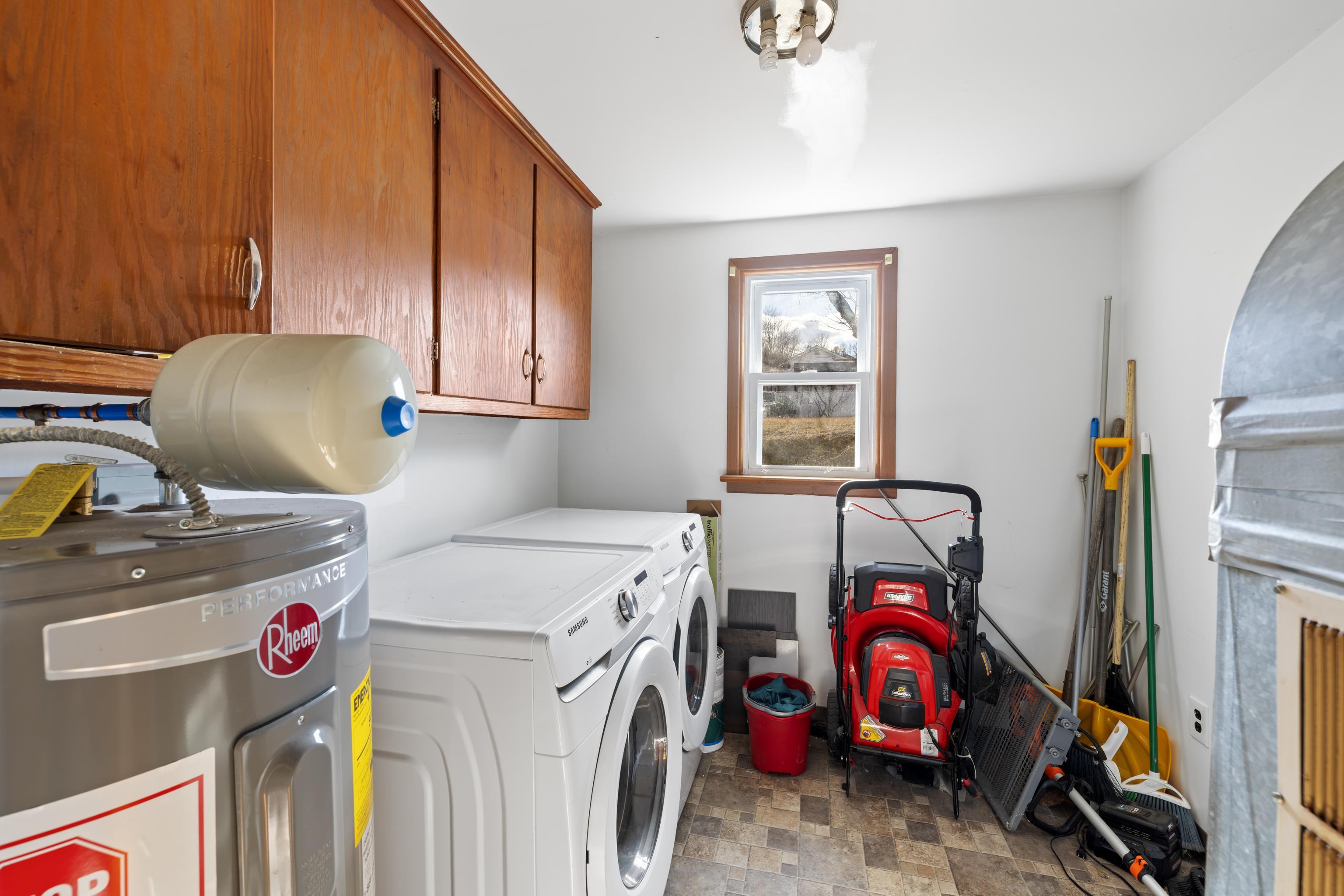 1340 B Street Waynesboro, VA 22980 - Photo 30 of 52 a utility room with dryer washer and a view of living room