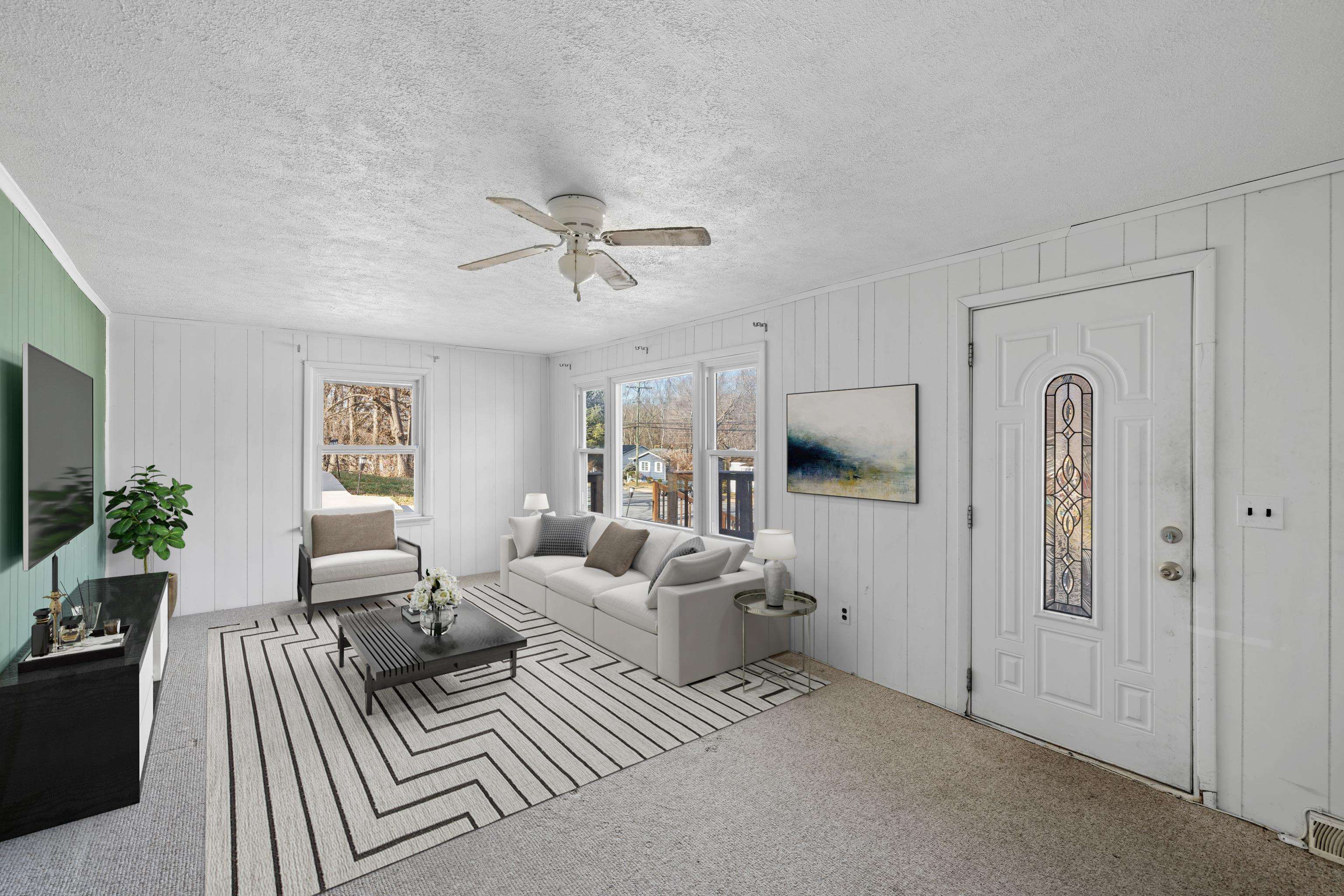 1340 B Street Waynesboro, VA 22980 - Photo 6 of 52 a living room with furniture and a flat screen tv