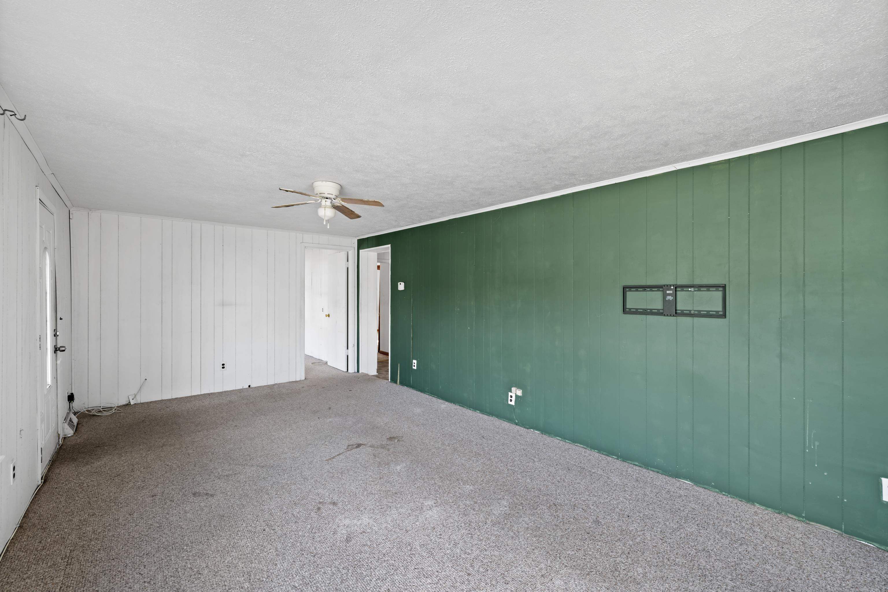 1340 B Street Waynesboro, VA 22980 - Photo 7 of 52 a view of a big room with closet and chandelier fan