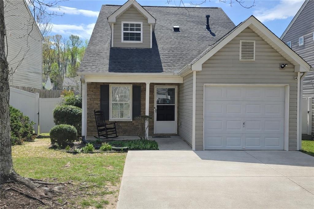 163 Silver Fox Trail Dallas, GA 30157 - Photo 1 of 35 a front view of a house with a yard