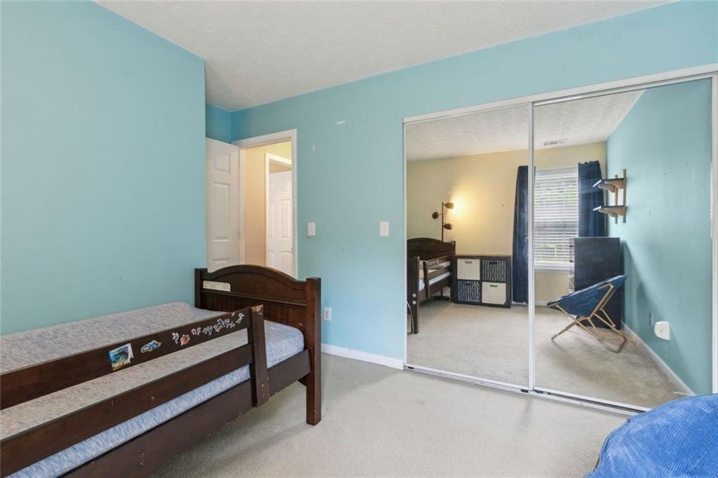 163 Silver Fox Trail Dallas, GA 30157 - Photo 20 of 35 a room with furniture and air hockey table