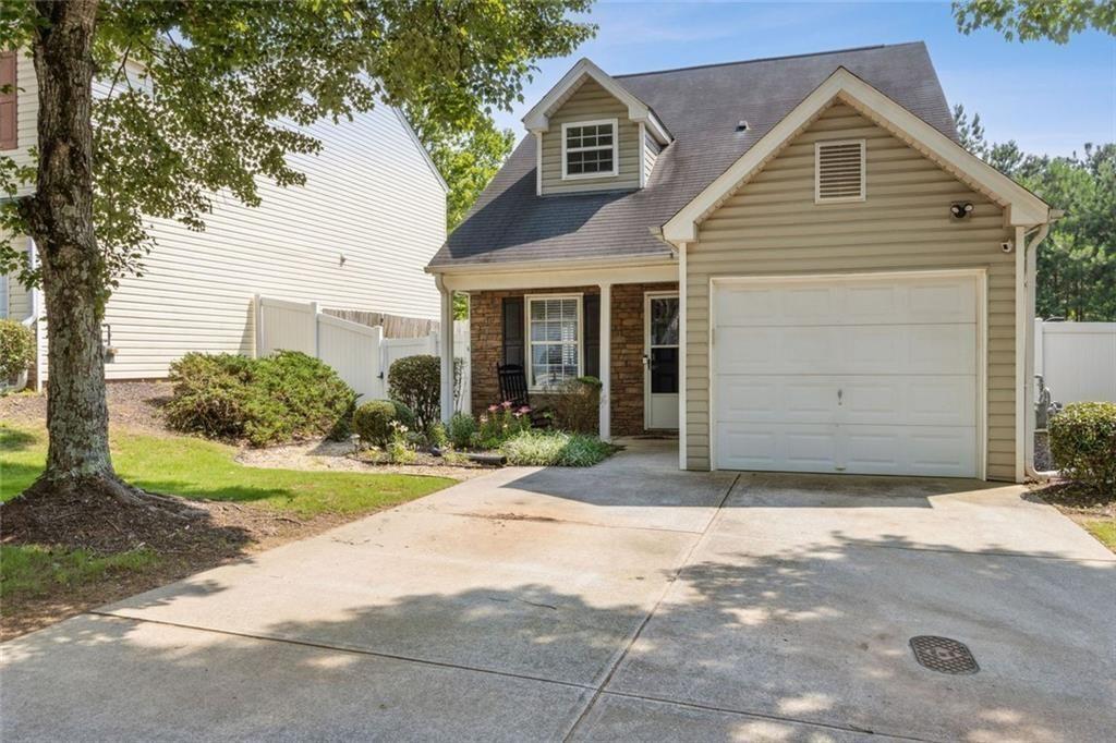 163 Silver Fox Trail Dallas, GA 30157 - Photo 32 of 35 a view of a house with a yard plants and large tree